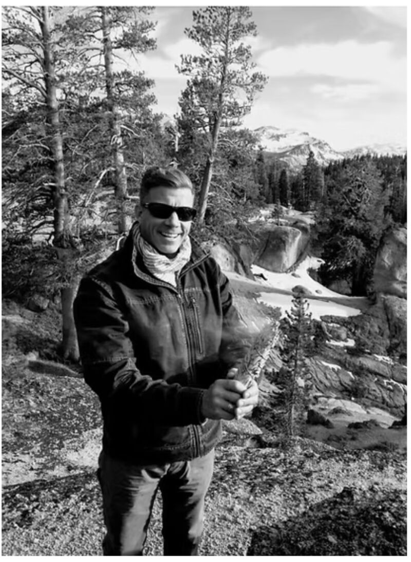 Black-and-white outdoor portrait of Dr. Bill Bastian